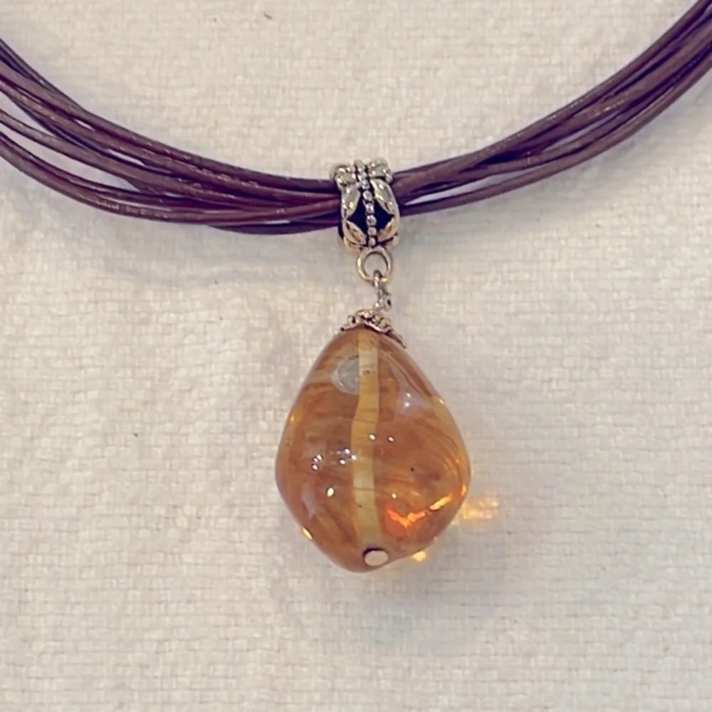 Lia Sophia Buona Sera amber pendant brown leather cord necklace